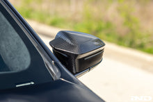 Load image into Gallery viewer, TREVORA Carbon Fiber Mirror Cover Set - BMW M5 (G90) 2025-2027 / i5 M60 (G60) 2024-2026
