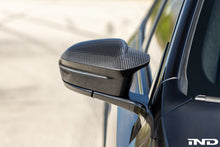 Load image into Gallery viewer, TREVORA Carbon Fiber Mirror Cover Set - BMW M5 (G90) 2025-2027 / i5 M60 (G60) 2024-2026