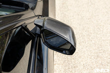 Load image into Gallery viewer, TREVORA Carbon Fiber Mirror Cover Set - BMW M5 (G90) 2025-2027 / i5 M60 (G60) 2024-2026