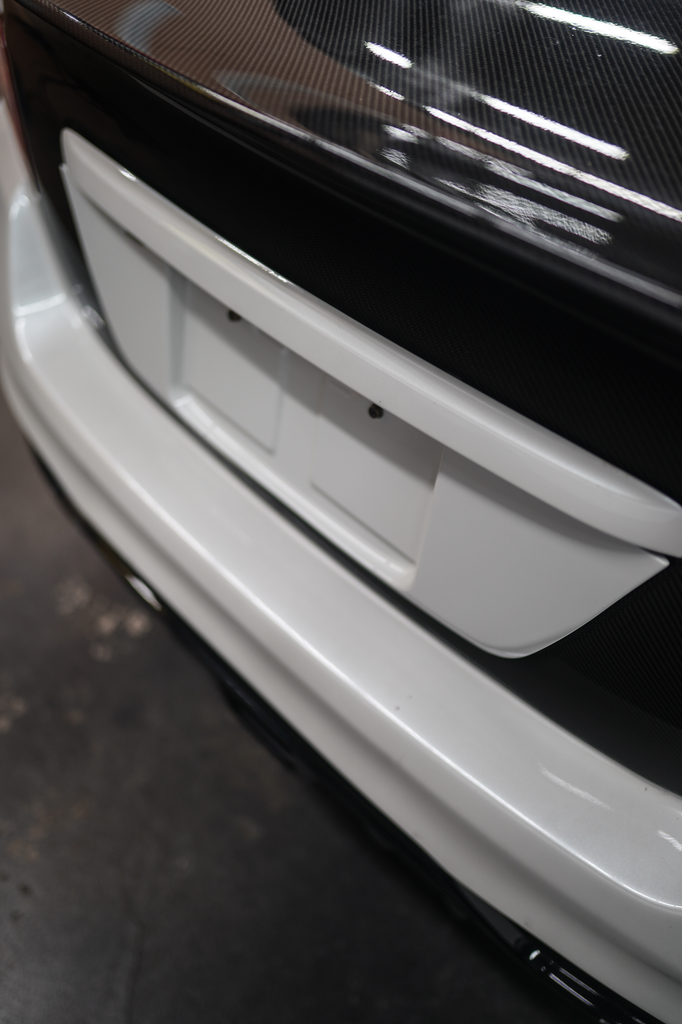 JDMuscle Gloss Black / Paint Matched License Plate Backing - Subaru WRX / STi 2015-2021