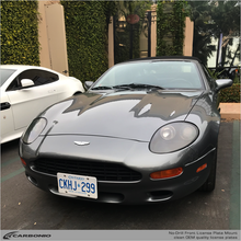 Load image into Gallery viewer, Carbonio No-Drill Front License Plate Mount - Aston Martin Vantage 1993-2026