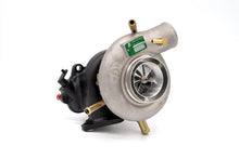 Load image into Gallery viewer, Forced Performance Green 60mm Turbo (Black Housing; Internal WG w/Oil Line) - Subaru WRX 2002-2007 / STi 2004-2021