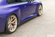 Load image into Gallery viewer, TREVORA Carbon Flat Side Skirt Set - BMW M2 (G87) 2023+